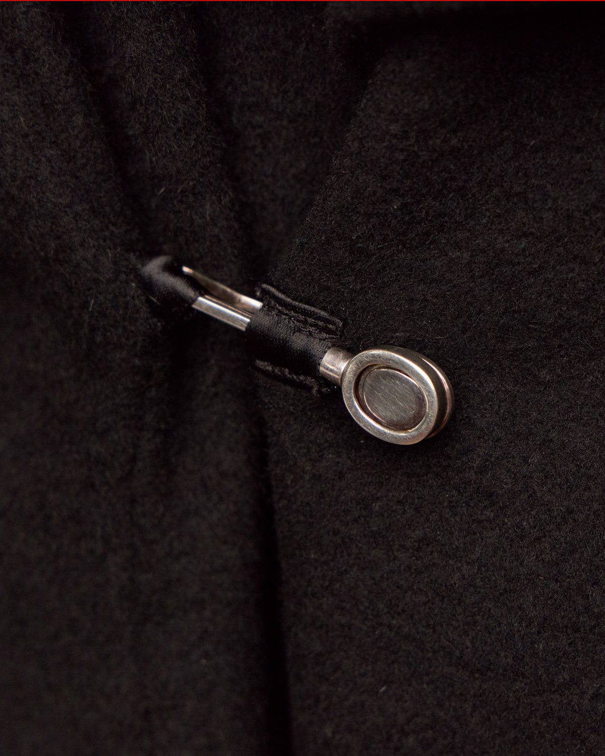 Dinner Coat, clasp detail