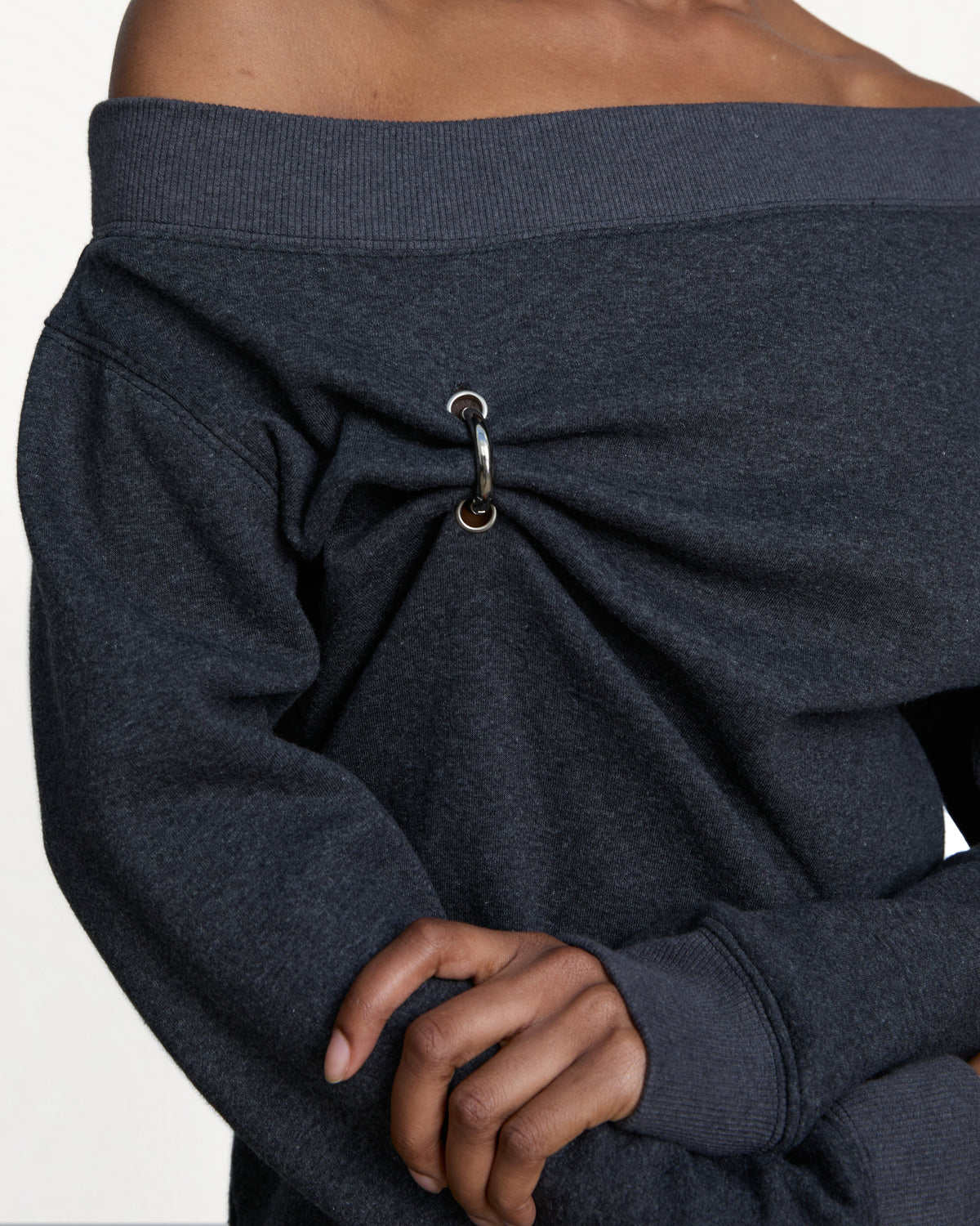 Close view of the ring and gathers on the shoulder of the Stadion Grab sweater