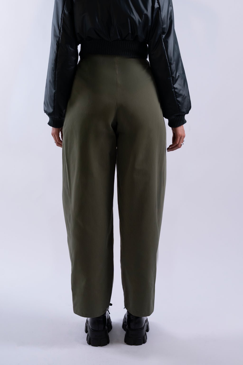 Back view of Double Pleat Trouser showing high waist and wide-leg silhouette.