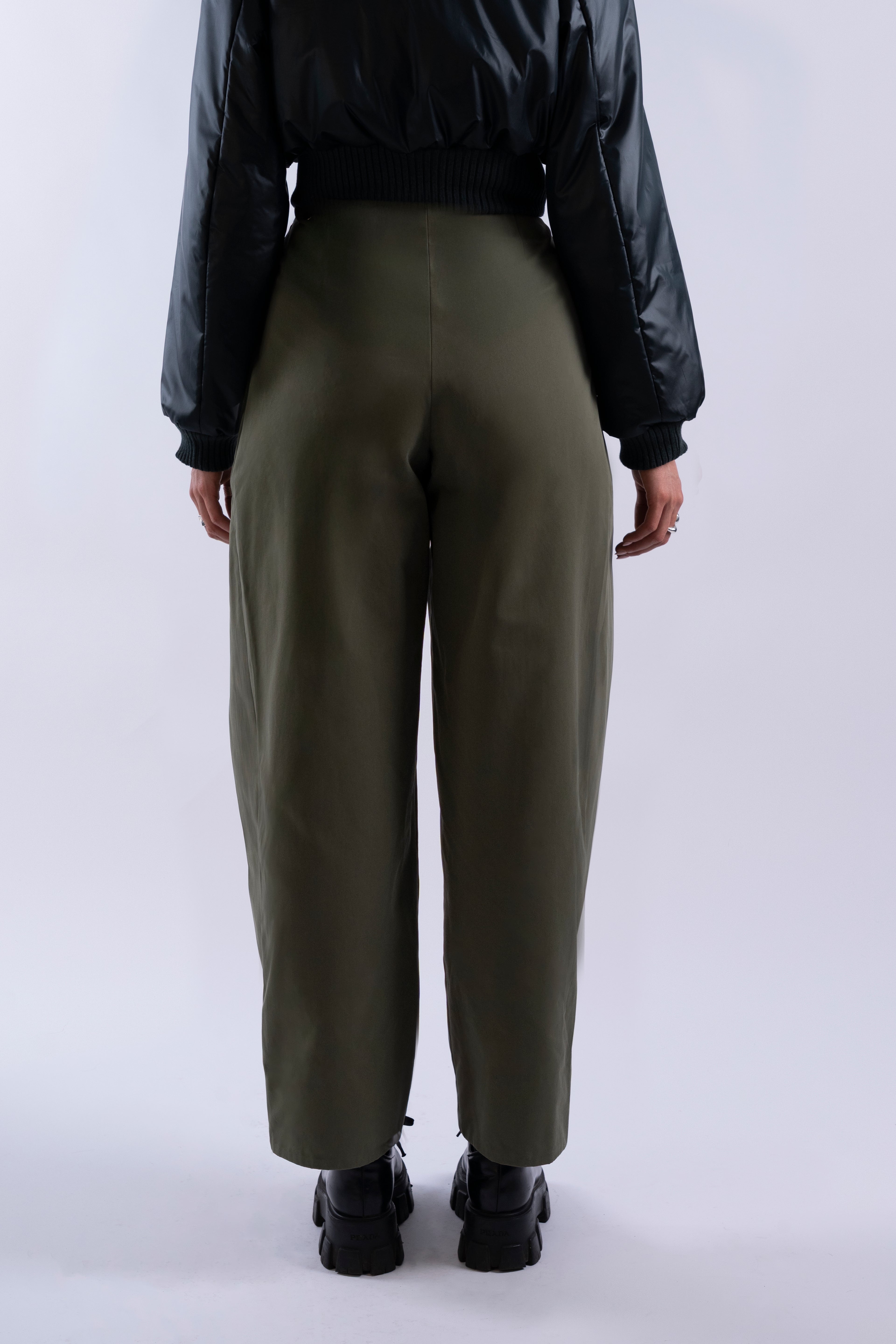 Back view of Double Pleat Trouser showing high waist and wide-leg silhouette.