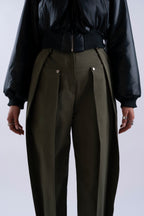 Close-up of pleated front and silver hardware on Double Pleat Trouser.