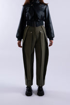 Front view of Stadion Double Pleat Trouser in fatigue green showing dual pleats and silver hardware.