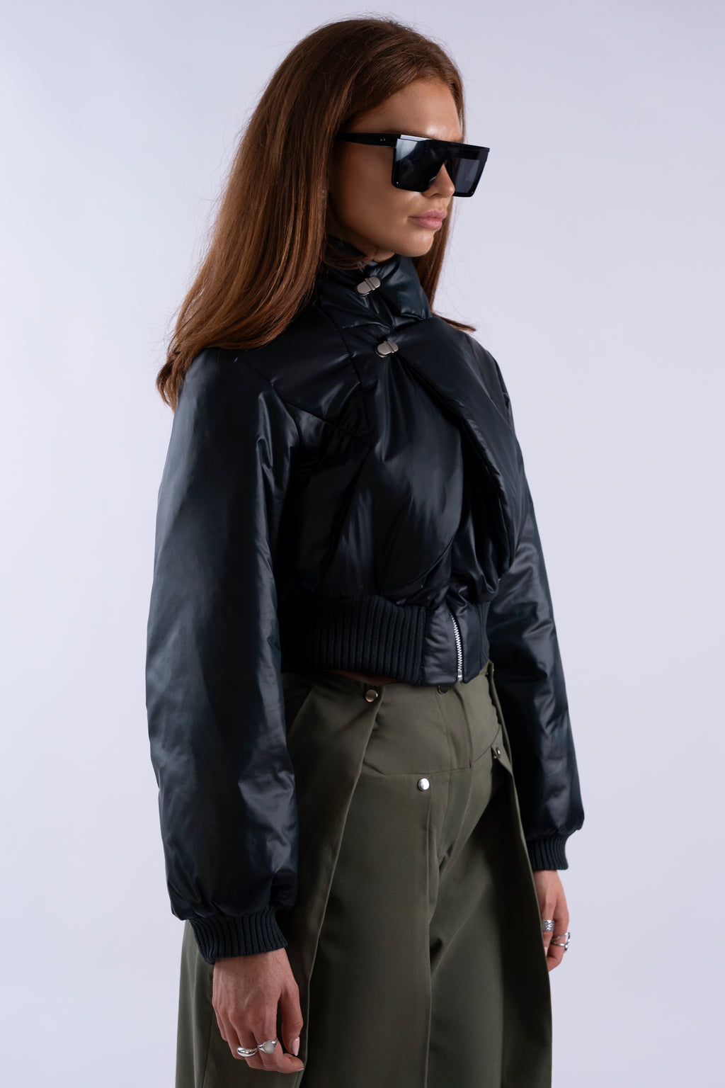 Angled view of Interface Bomber in Midnight Forest highlighting hardware and shaping.