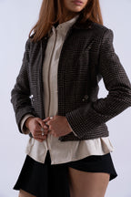 Side angle of Stadion Lukret Coach Jacket highlighting metal snap detailing and tailored silhouette.