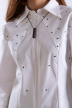 Close-up of front zip and eyelet detailing on Stadion Oculus Shirt.