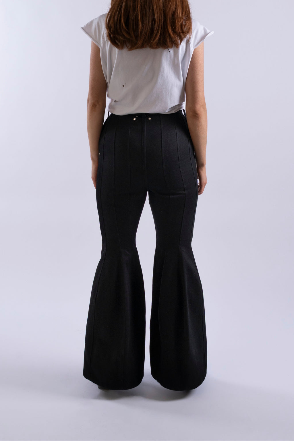 Back view of Stadion RVT Jeans showing panelled seams and flared leg shape.