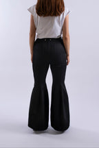 Back view of Stadion RVT Jeans showing panelled seams and flared leg shape.